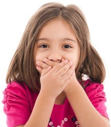 Young Kidz Dental_Young Girl Covering her Mouth
